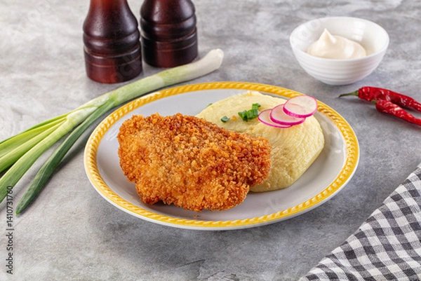 Fototapeta Chicken schnitzel with mashed potatoes