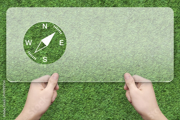 Obraz Compass symbol message box with green grass background