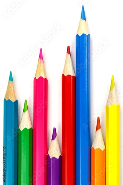 Fototapeta Set of colored pencils on a white background, chaotic arrangement