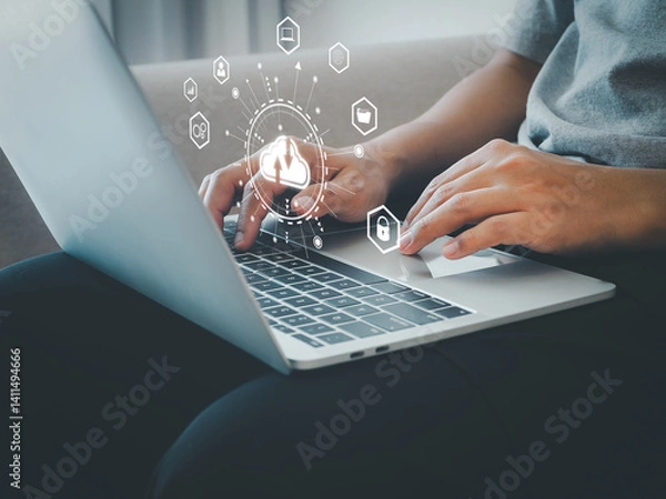 Fototapeta Businessman uses cloud computing technology via laptop to connect to backup and store data in online cloud system on internet network in future.