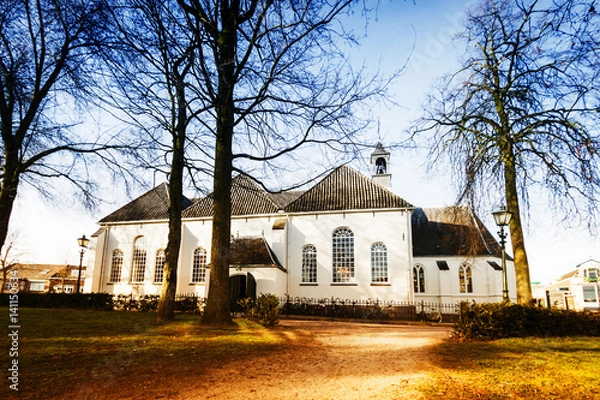 Obraz Old church in the center of town.
Contrasting picture, with warm and cool tones.
The town of Veenendaal in the Netherlands.
