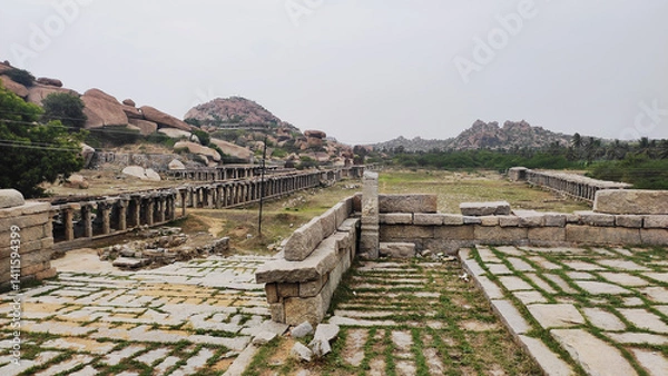 Fototapeta Architecture of ancient ruins of temple in Hampi, Karnataka, India