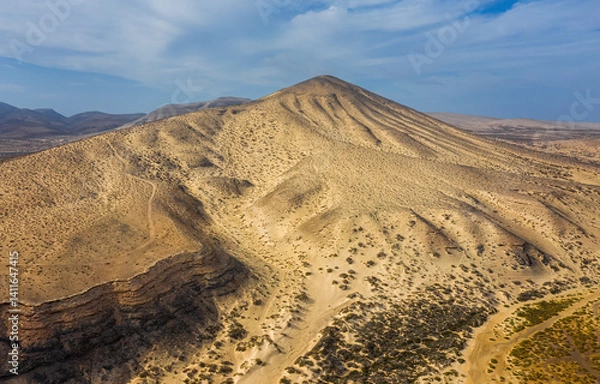 Fototapeta This is an aerial drone shot from Canary islands. Sotavento beach is on the coast of Fuerteventura island. October 2019