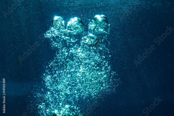 Obraz A nice picture of underwater bubbles illuminated by the sun.