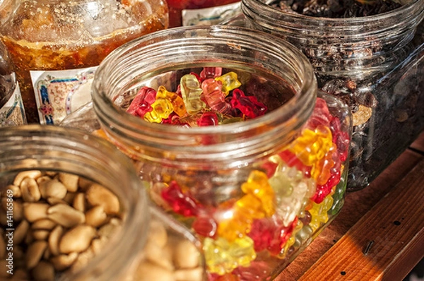 Fototapeta Close-up on a jar filled with gummy jelly bears