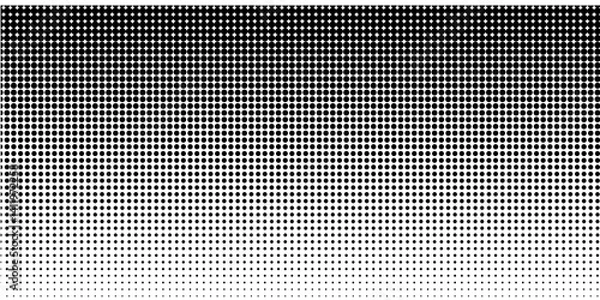 Fototapeta Basic halftone dots effect in black and white color. Halftone effect. Halftone dots. Black white halftone.Background with monochrome dotted