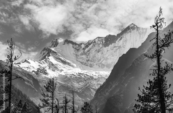 Fototapeta Himalayas, Nepal - The famous hiking on the roof of the world called Annapurna Circuit in the Himalaya range mountain, with little village, buddhist stupa and mountains of 8000 meters.