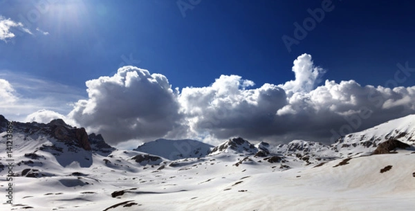 Fototapeta Panoramic view on plateau covered snow at spring day