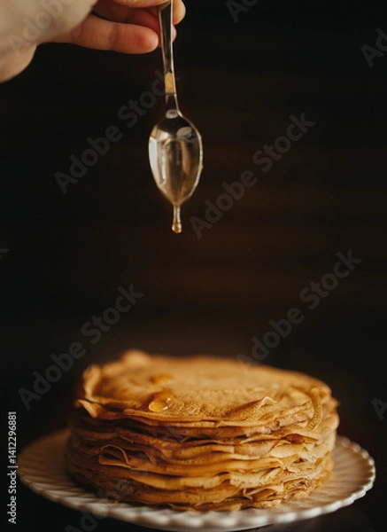 Obraz honey dripping from a spoon