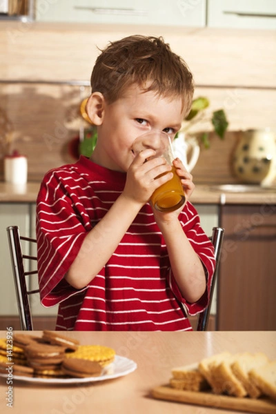 Obraz Child drinking juice