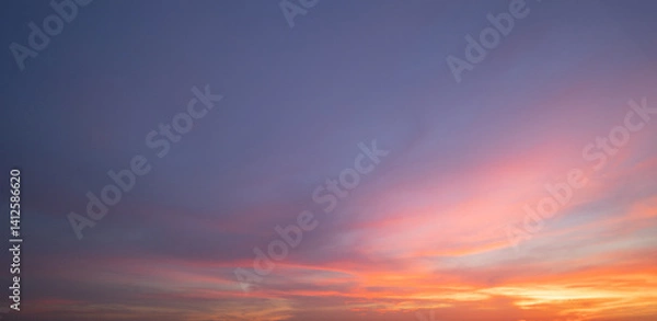 Obraz Sunset sky. Abstract nature background. Dramatic blue with orange colorful clouds in twilight time.