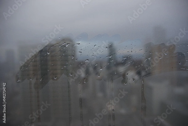 Obraz 雨に濡れた窓ガラス