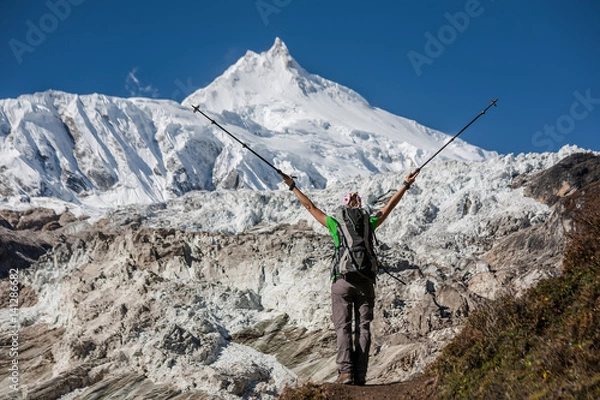 Fototapeta Trekker in front of Manaslu glacier on Manaslu circuit trek in Nepal