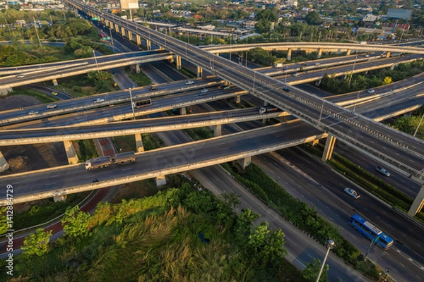 Obraz Aerial view of Expressway transport traffic road with vehicle movement in morning, Logistic concept.