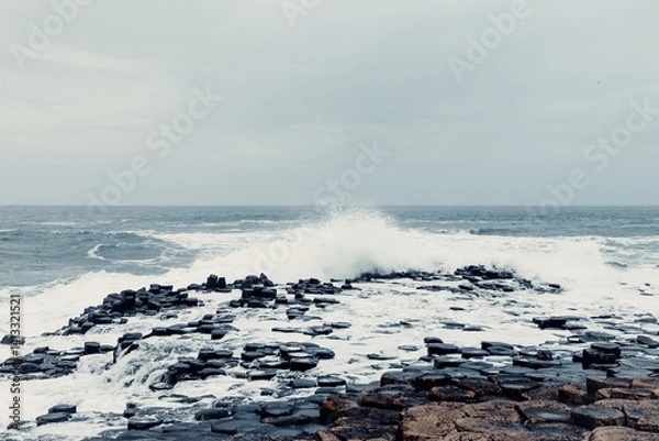 Obraz Storm Waves Crash Against the Giant’s Causeway Rocks with Dark Skies	