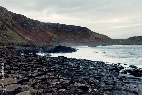 Obraz Storm Waves Crash Against the Giant’s Causeway Rocks with Dark Skies	