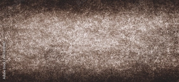 Fototapeta Dark brown felt material. Surface of felted fabric texture abstract background in brown color. High resolution photo.

