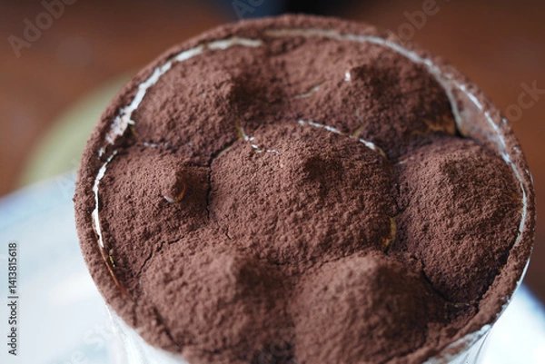 Obraz Delicious chocolate dessert layered with cocoa powder in close-up