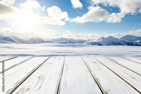 Fototapeta Empty white wooden floor or table podium. Landscape mountain surrounded by snow is background. Blue sky with white clouds, bright sunlight. Abstract Texture. Advertising display.
