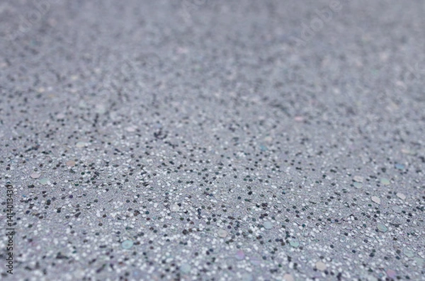 Fototapeta Full frame macro abstract texture background of sparkling silvery white glitter surface with copy space
