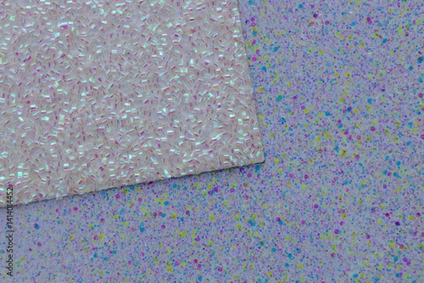 Fototapeta Full frame macro abstract texture background of sparkling layered glitter card stock in colors of white and blue