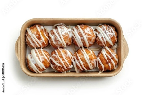 Fototapeta Freshly Baked Sweet Cinnamon Buns with Icing Drizzle on White Background