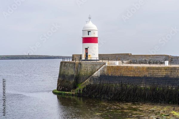 Fototapeta The lighthouse on the pier in Castletown, Isle of Man
