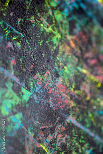 Fototapeta Thick abstract paint surface with heavy texture looking a bit like graffiti hand drawn real dark background