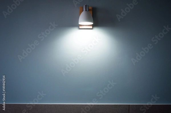 Obraz the White Light Beam from lamp on blue wallpaper background