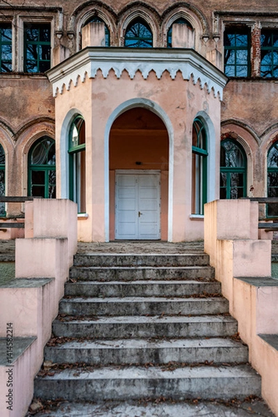 Fototapeta Large, elegant Odziena Manor, a castle built in the neo-Gothic style. Stairs lead to the door entryway of the mansion. Rear facade. Latvia.