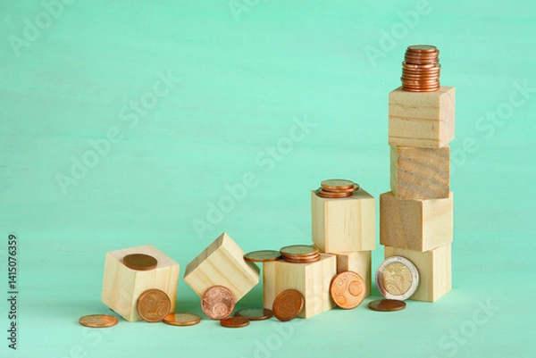 Obraz Business concept for financial growth, interest rate increase, inflation, high price, tax and tariffs rise .Wooden cube blocks and stack of coins, free  copy space