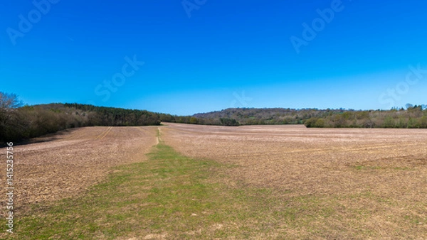 Fototapeta Footpath across ploughed land in Shipbourne near Tonbridge, Kent, England 