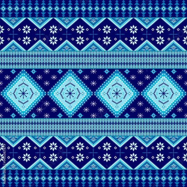 Obraz Celestial blue ethnic pattern with diamond medallions and zigzag borders, weaving traditional craftsmanship into a mesmerizing digital tapestry of cultural symmetry and depth.