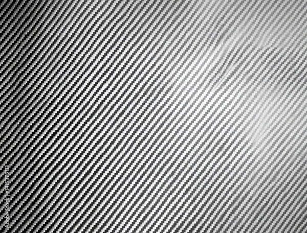 Fototapeta Use this carbon fiber composite as a background to highlight cutting-edge technology.