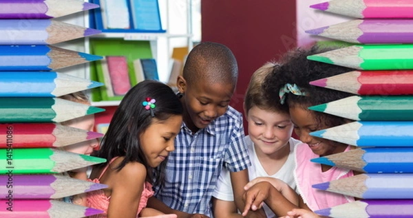 Obraz Image of pencils over diverse schoolchildren using tablet and smiling