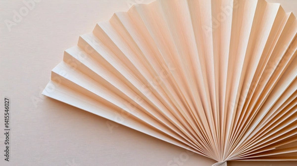 Fototapeta Beige Paper Fan Closeup On Light Background