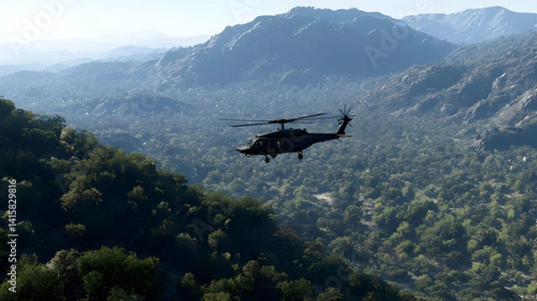 Obraz Military Helicopter Over Lush Mountainous Landscape