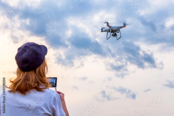 Obraz Drone operated by a woman
