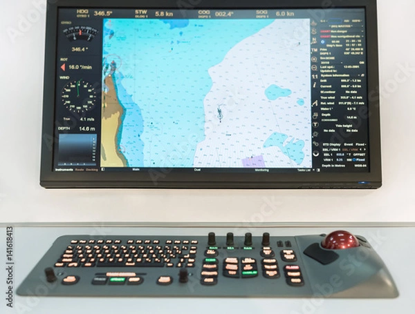 Fototapeta Navigational panel on a boat. Сoastline map on a screen of a navigator on a commercial shipping vessel.