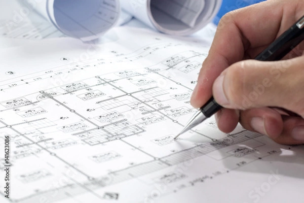 Fototapeta Engineering diagram blueprint paper drafting project sketch architectural,selective focus