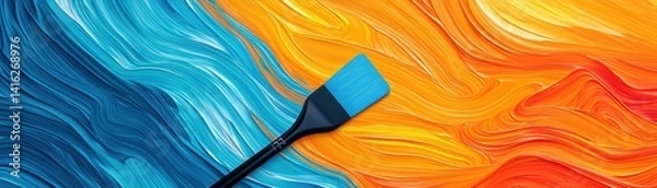 Fototapeta A colorful abstract design featuring a blue spatula on vibrant orange and blue swirls.