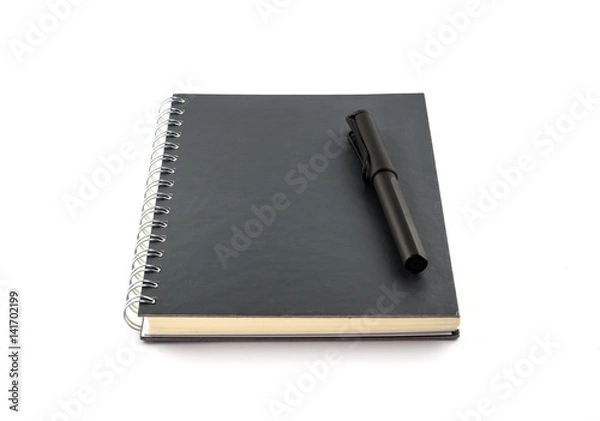 Fototapeta Black pen and blank notebook isolated on white background