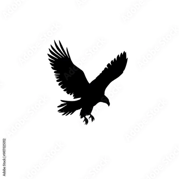Fototapeta Silhouette of an eagle with wings spread coming down isolated on white background