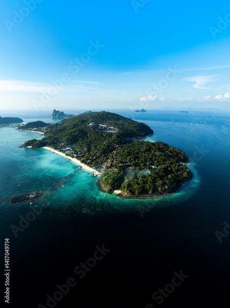 Obraz Top-down aerial shot of Phi Phi Don island, showcasing tropical beaches, lush vegetation, and clear turquoise waters in southern Thailand.
