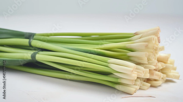 Fototapeta A vibrant bunch of fresh green onions showcases their crisp texture and bright color, perfect for enhancing your favorite dishes and salads.