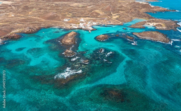 Obraz Aerial view of Puertito village and the beautiful natural pools  lagoons of the island of Lobos near Corralejo in Fuerteventura Spain