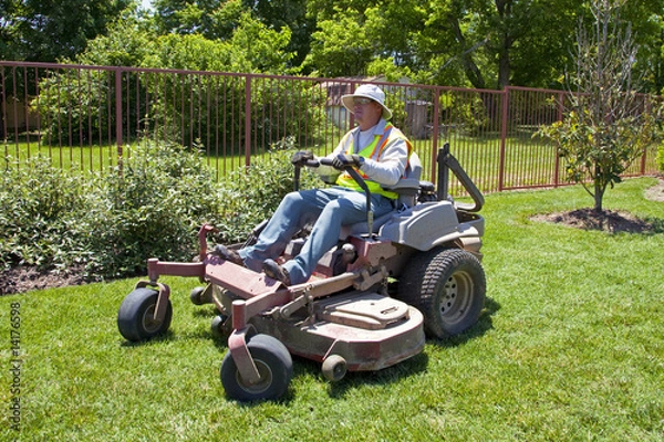 Fototapeta Commericial Lawn Mowing with Zero Turn