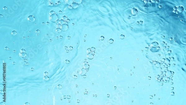 Fototapeta Transparent blue colored clear calm water surface texture with splashes and bubbles. Trendy abstract nature background.