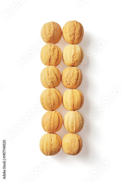 Fototapeta Top view of baked nuts with condensed milk inside isolated on white background