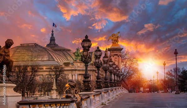 Obraz Alexandre III Bridge with Roof of the Grand Palais in the background at sunset - Paris, France